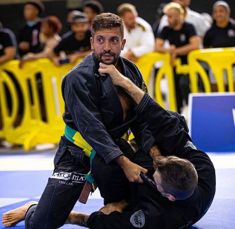 Alberto coaching on the mats.